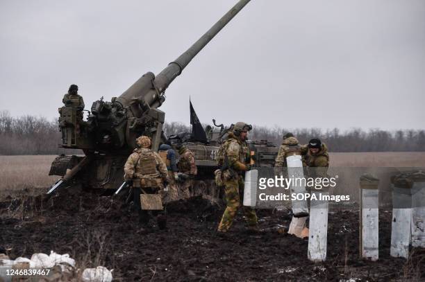 Ukrainian troops prepare to fire a Pion artillery system in the direction of Bakhmut. Ammunition for the Pion system is hard to find in Ukraine, with...
