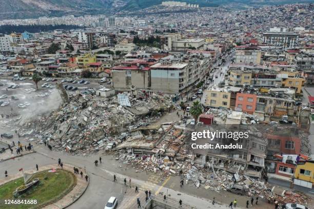 An aerial view of debris of a collapsed building after 7.7 magnitude earthquake hits Hatay, Turkiye on February 06, 2023. Disaster and Emergency...