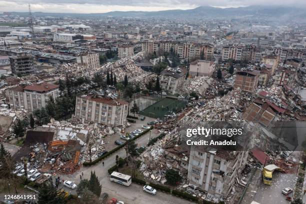 An aerial view of debris of a collapsed building after 7.7 magnitude earthquake hits Hatay, Turkiye on February 06, 2023. Disaster and Emergency...