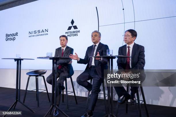 Luca de Meo, chief executive officer of Renault SA, center, Makoto Uchida, chief executive officer of Nissan Motor Co., left, and Takao Kato, chief...