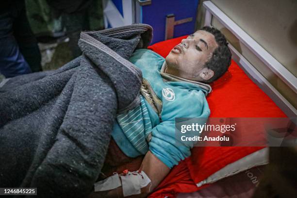 Child, rescued under the rubble, is seen in a hospital under treatment in Idlib, Syria after a 7.7 magnitude earthquake hits Turkiye's Kahramanmaras,...