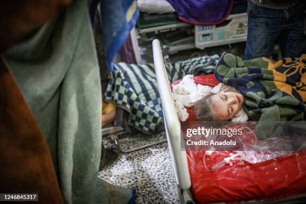 Child, rescued under the rubble, is seen in a hospital under treatment in Idlib, Syria after a 7.7 magnitude earthquake hits Turkiye's Kahramanmaras,...