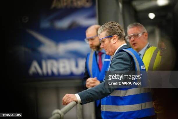 Labour leader Sir Keir Starmer and Labour Party shadow business secretary Jonathan Reynolds stand on a gantry to view the testing of aircraft wings,...