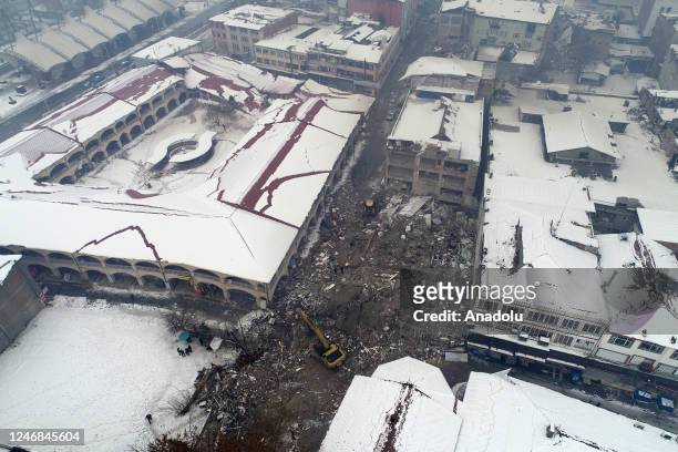 An aerial view of debris of a collapsed building after 7.7 magnitude earthquake hits Malatya, Turkiye on February 06, 2023. Disaster and Emergency...