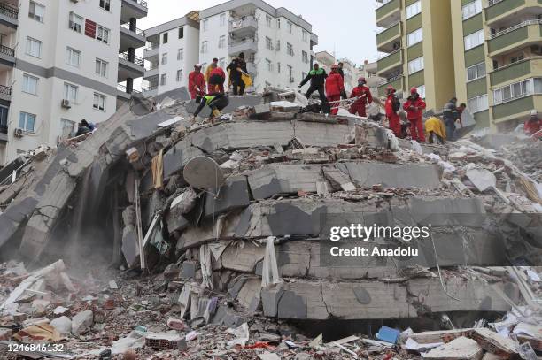 Personnel conduct search and rescue operations in Adana, Turkiye after 7.7 and 7.6 magnitude earthquakes hits Turkiye's Kahramanmaras, on February...