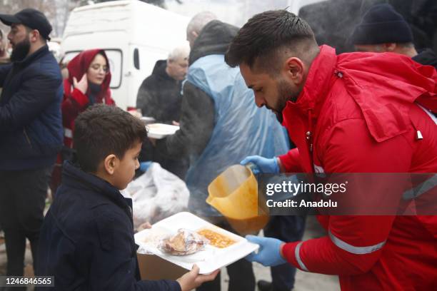 Turkish Red Crescent teams distribute hot meals to the earthquake victims in Malatya, Turkiye after 7.7 and 7.6 magnitude earthquakes hits Turkiye's...