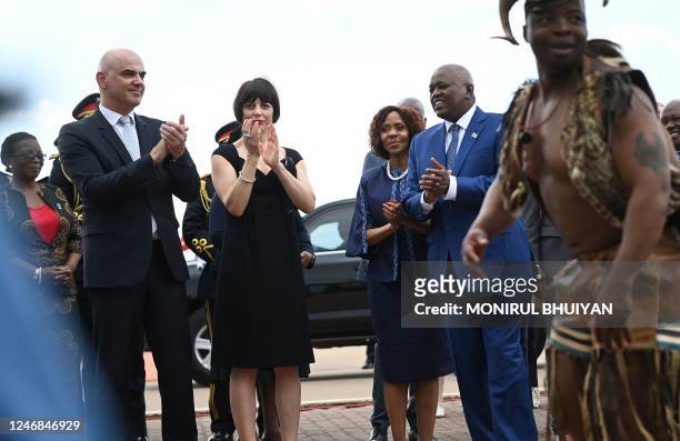 Swiss President Alain Berset and his wife Muriel Zeender Berset applaud together with the Botswana President Dr Mokgweetsi Masisi and First Lady Neo...
