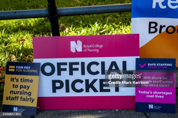 Signs are pictured at an official picket line outside the Royal Berkshire Hospital on 6 February 2023 in Reading, United Kingdom. Nurses in England...