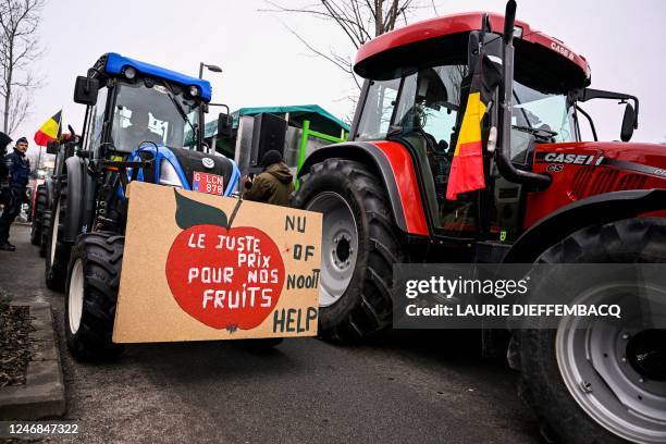 Belgian fruit producers hold a protest action to demand higher prices for their goods, in front of the headquarters of trade organisation Comeos in...