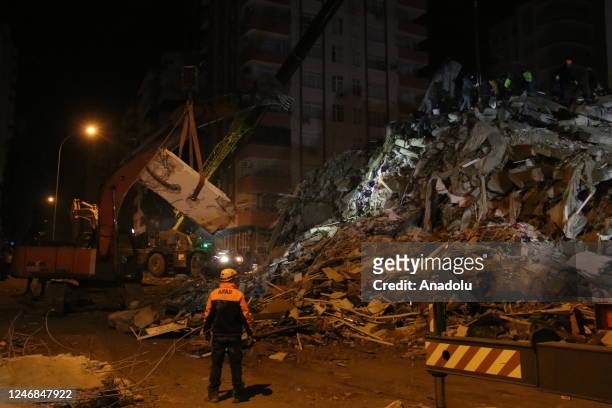 Personnel conduct search and rescue operations in Adana, Turkiye after 7.7 and 7.6 magnitude earthquakes hits Turkiye's Kahramanmaras, on February...