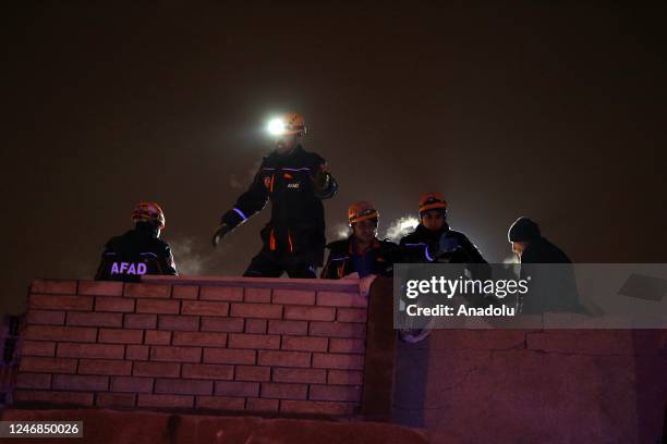 Personnel conduct search and rescue operations in Malatya, Turkiye after 7.7 and 7.6 magnitude earthquakes hit Turkiye's Kahramanmaras, on February...