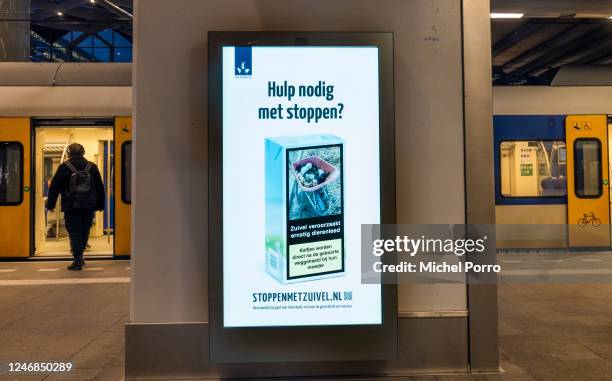 Poster saying 'Dairy causes severe animal suffering', the message of this Stop With Dairy campaign poster at this train station, is seen after Dutch...