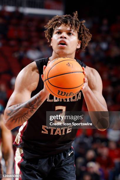 Florida State Seminoles forward Cam Corhen shoots a free throw during a college basketball game against the Louisville Cardinals on February 4, 2023...