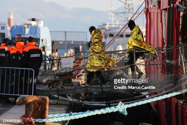 Migrants disembark in Naples, from the Sea-Eye 4 rescue ship, after being saved from a shipwreck in the Mediterranean sea.