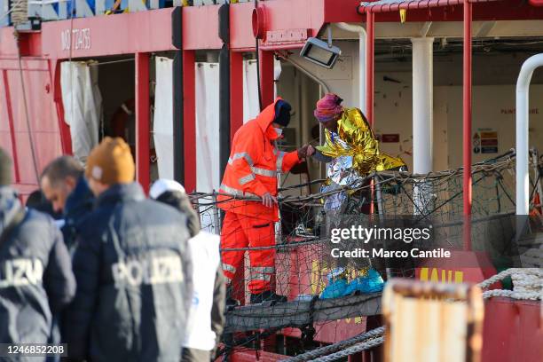 Migrant disembarks in Naples, from the Sea-Eye 4 rescue ship, after being saved from a shipwreck in the Mediterranean sea.