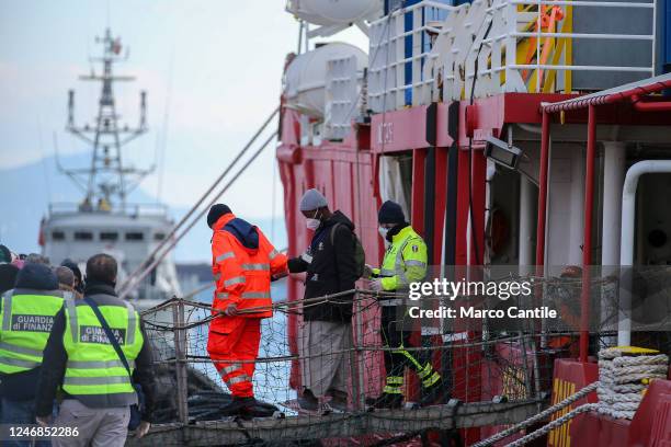 Migrant disembarks in Naples, from the Sea-Eye 4 rescue ship, after being saved from a shipwreck in the Mediterranean sea.