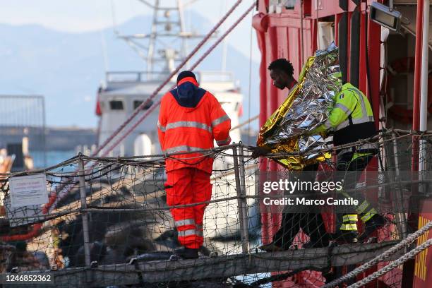 Migrant disembarks in Naples, from the Sea-Eye 4 rescue ship, after being saved from a shipwreck in the Mediterranean sea.