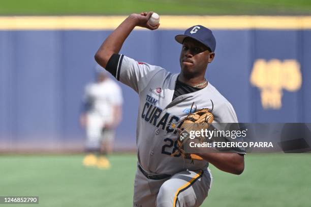 Curacao's WildCats pitcher Jordan Lucas throws the ball during their Caribbean Series game against Puerto Rico's Indios de Mayaguez at the Monumental...