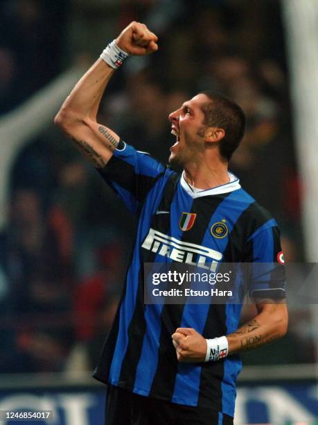 Marco Materazzi of Inter Milan celebrates scoring his side's fourth goal during the Serie A match between AC Milan and Inter Milan at the Stadio...
