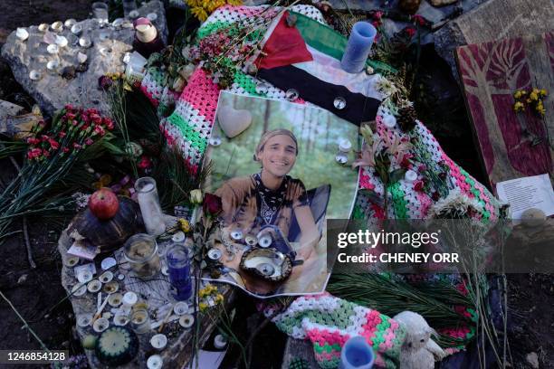 Makeshift memorial for environmental activist Manuel Teran, who was deadly assault by law enforcement during a raid to clear the construction site of...