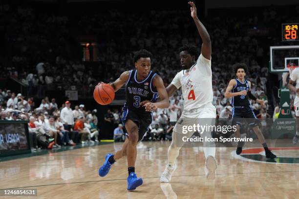 Duke Blue Devils guard Jeremy Roach drives to the basket as Miami Hurricanes guard Bensley Joseph defends during the game between the Duke Blue...