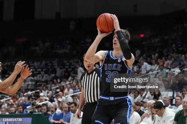 Duke Blue Devils center Kyle Filipowski takes a three pointer attempt during the game between the Duke Blue Devils and the Miami Hurricanes on...