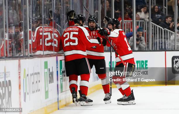 Aidan McDonough of the Northeastern Huskies celebrates his goal during the first period against the Boston University Terriers during NCAA hockey in...