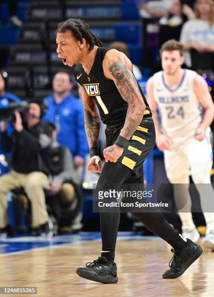 Guard Ace Baldwin Jr reads after hitting a three-point shot during a college basketball game between the VCU Rams and the Saint Louis Billikens on...