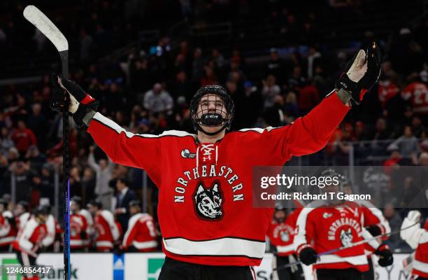 Hunter McDonald of the Northeastern Huskies celebrates his empty-net goal against the Boston University Terriers during the third period during NCAA...