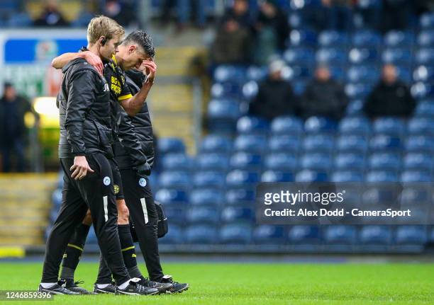 Wigan Athletic's Martin Kelly leaves the field injured during the Sky Bet Championship between Blackburn Rovers and Wigan Athletic at Ewood Park on...