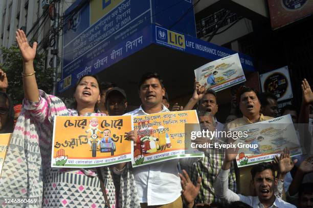 Activists demonstrate and burn effigies of Indian prime minister Modi and business tycoon Gautam Adani, in protest against the Adani Group crisis, on...