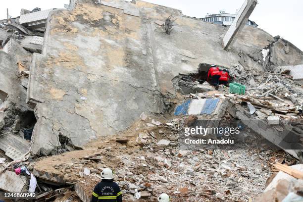 View of collapsed building as search and rescue efforts continue after 7.7 and 7.6 magnitude as the earthquakes hit Gaziantep, Turkiye on February...