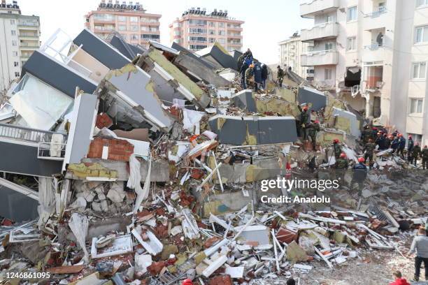 View of collapsed building as search and rescue efforts continue after 7.7 and 7.6 magnitude as the earthquakes hit Gaziantep, Turkiye on February...