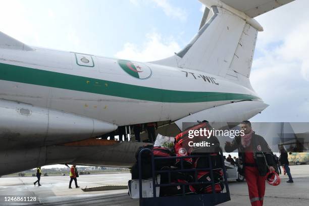 Graphic content / Algerian rescue teams arrive at Aleppo International Airport on February 7 one day after a deadly earthquake hit Syria and Turkey....