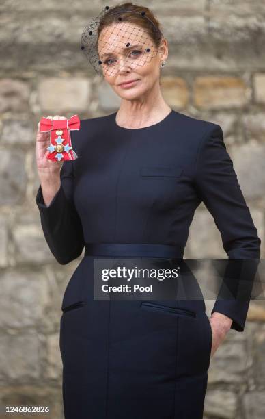 Stella McCartney after being made a Commander of the Order of the British Empire by King Charles III during an investiture ceremony at Windsor Castle...