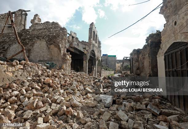 Picture shows rubble in Aleppo's old town on February 7, 2023 following a deadly earthquake. - The Syrian Red Crescent appealed to Western countries...