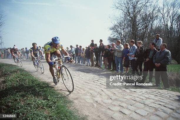 The peleton ride the cobbles in the 100th Paris Roubaix known as the ''Hell of the North''. The race was won by Johan Museeuw of Belgium in a record...