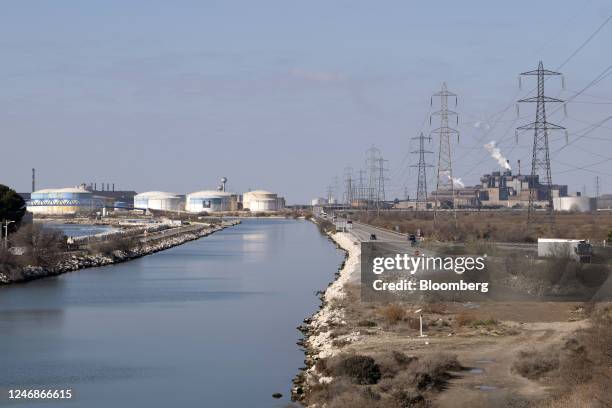 Petroleum and chemical storage tanks at the Depots Petroliers de Fos terminal, left, and the Arcelor Mittal steelworks in the industrial and port...