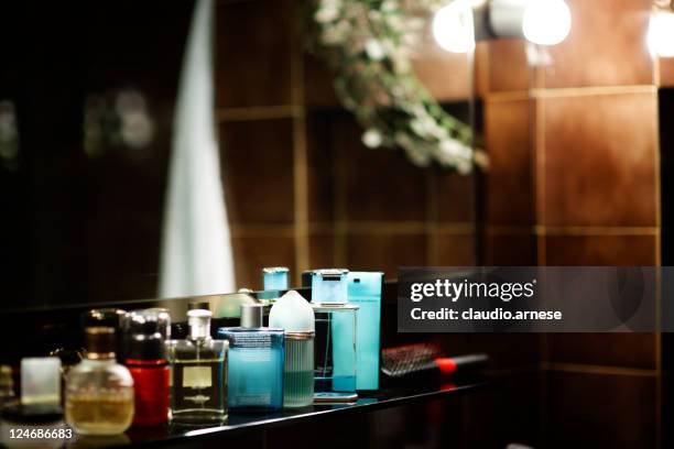 perfume in a bathroom. color image - perfume sprayer stock pictures, royalty-free photos & images