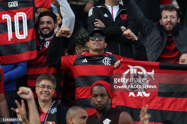 Flamengo supporters cheer during the FIFA Club World Cup semi-final football match between Brazil's Flamengo and Saudi Arabia's Al-Hilal at the Ibn...