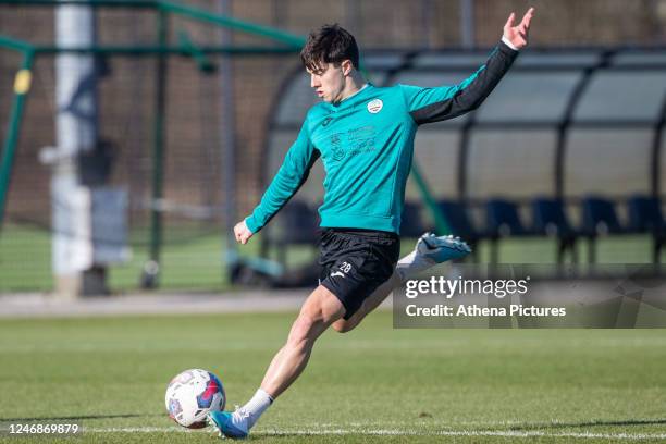 Liam Walsh of Swansea City AFC takes a shot during a training session at Fairwood Training Ground on February 07, 2023 in Swansea, Wales.