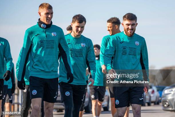 Jay Fulton, Liam Cullen and Ryan Manning of Swansea City AFC during a training session at Fairwood Training Ground on February 07, 2023 in Swansea,...