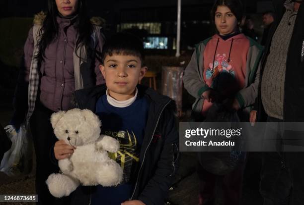 Iraqi people carry humanitarian aids to be sent for the victims of the devastating earthquakes in Turkiye as part of aid campaigns in Sulaymaniyah,...