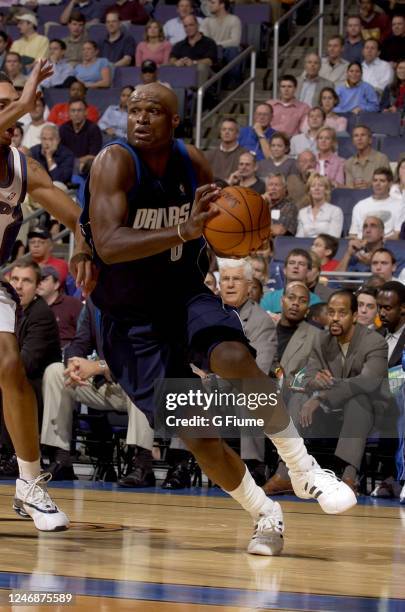 Antoine Walker of the Dallas Mavericks handles the ball against the Washington Wizards on November 2003 at the MCI Center in Washington DC. NOTE TO...