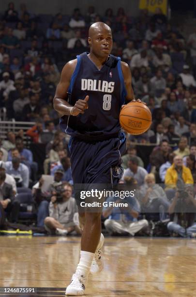 Antoine Walker of the Dallas Mavericks handles the ball against the Washington Wizards on November 2003 at the MCI Center in Washington DC. NOTE TO...