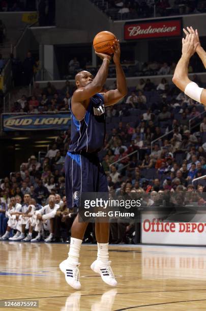 Antoine Walker of the Dallas Mavericks shoots the ball against the Washington Wizards on November 2003 at the MCI Center in Washington DC. NOTE TO...
