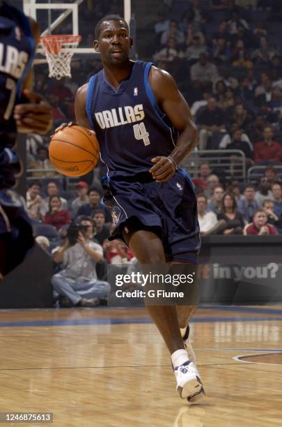 Michael Finley of the Dallas Mavericks handles the ball against the Washington Wizards on November 2003 at the MCI Center in Washington DC. NOTE TO...