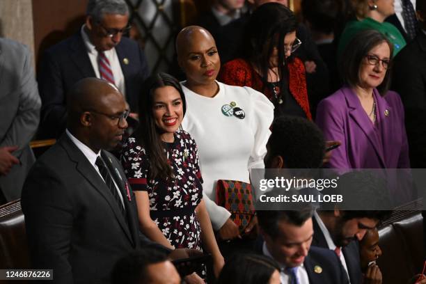 Representatives Jamaal Bowman , Alexandria Ocasio-Cortez , and Ayanna Pressley speak to US Representative Maxwell Frost prior to US President Joe...