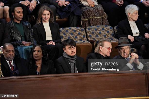 Paul Pelosi, husband of Representative Nancy Pelosi, a Democrat from California, from right, musician Bono, Brandon Tsay, who disarmed the shooter...