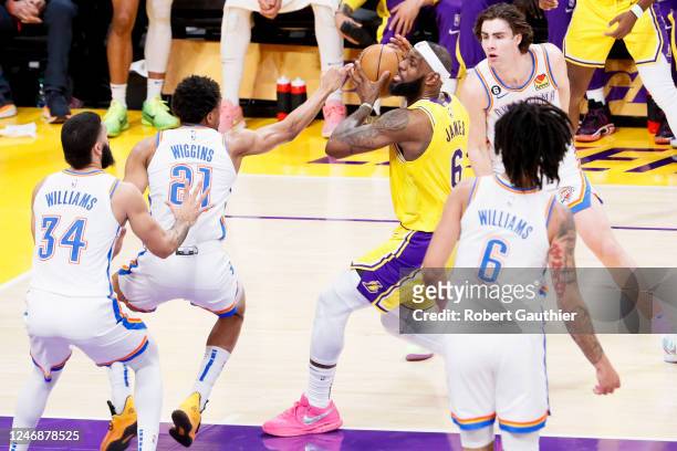 Los Angeles Lakers forward LeBron James drives to the basket while Oklahoma City Thunder guard Aaron Wiggins defends during the second quarter at...